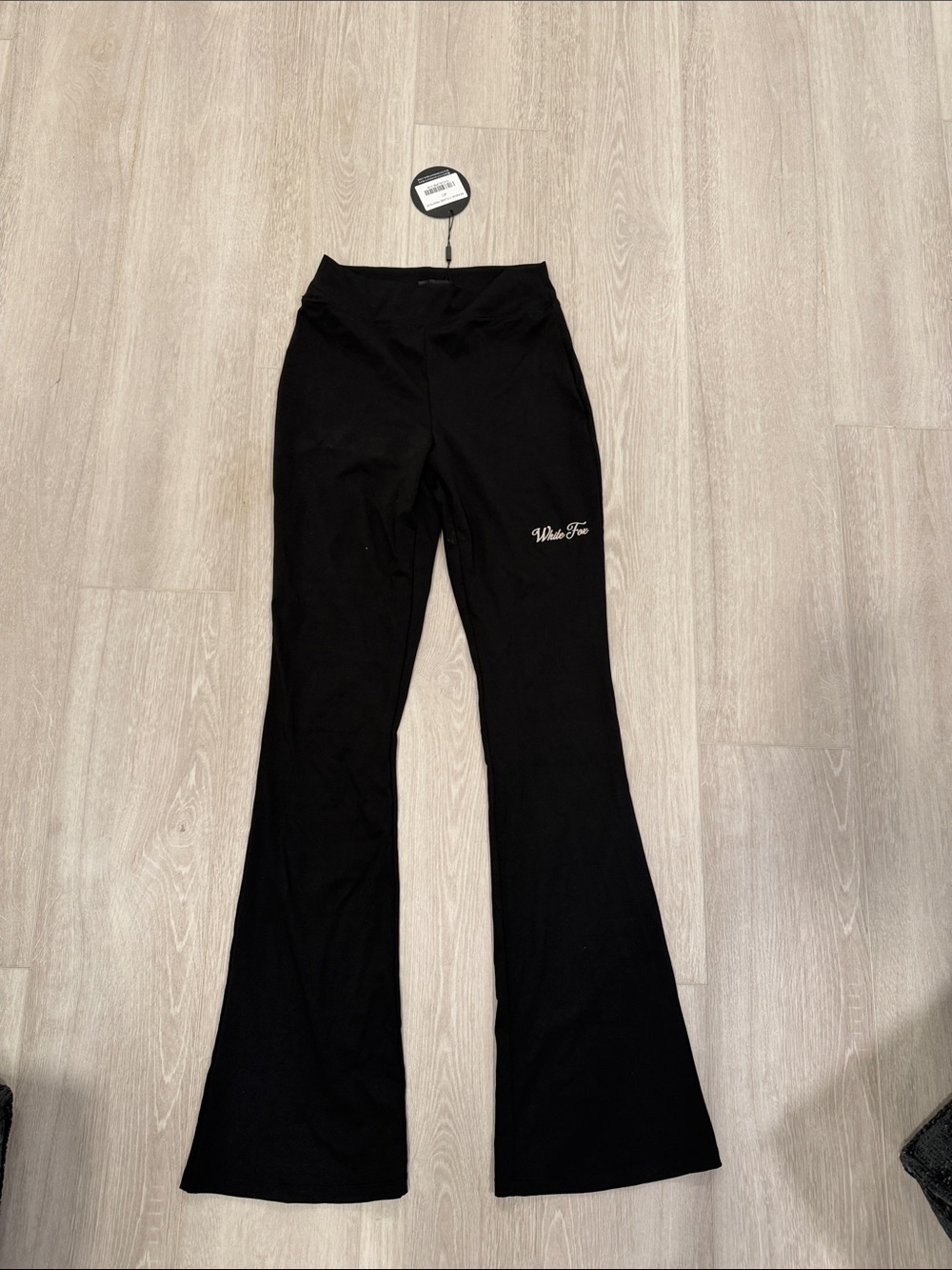White Fox Boutique Jet Black Season 7 Flare Pants Tag medium